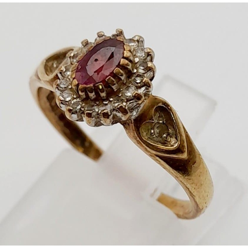 955 - A 9K Yellow Gold Ruby and Diamond Ring. Central ruby surrounded by a halo of diamonds. Size P. 2.5g