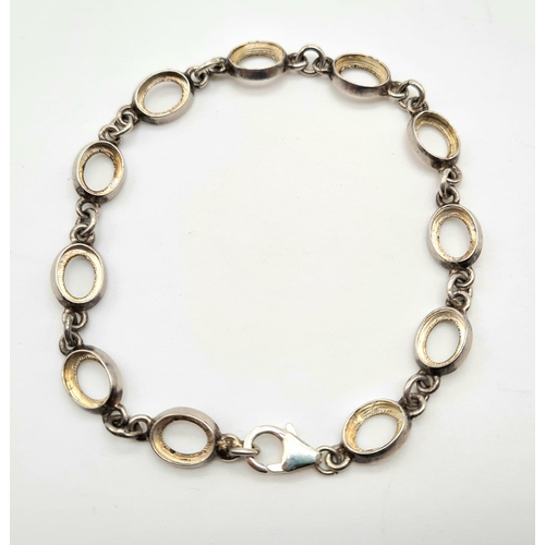 968 - STERLING SILVER OVAL LINK BRACELET. 6.5G.