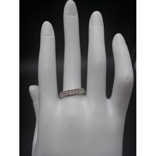 969 - A 9K White Gold Diamond Half Eternity Ring. 0.10ct. 
Size O. 2g