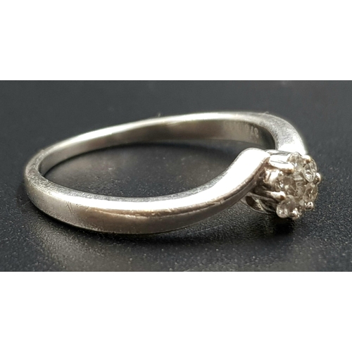 676 - 9k white gold diamond cluster ring, 0.15ct of diamonds, ring size P, total weight 2.3 grams