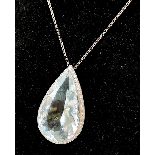 310 - A Large Flawless 62ct Aquamarine Teardrop-Cut Diamond Surround Pendant 18K White gold Pendant. On an... 