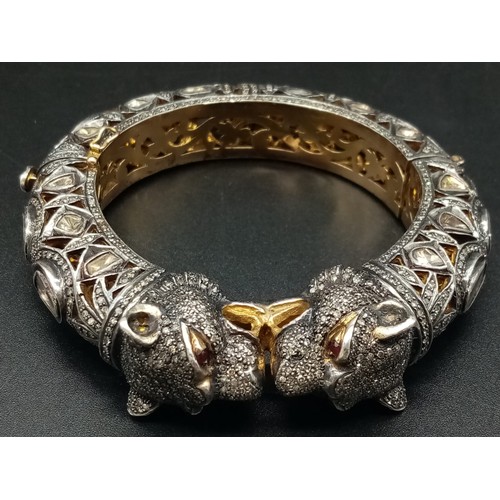 462 - An Antique Cartier Style 18K Gold, Platinum and Rose Cut Diamond Bangle. Ruby eyes on panthers, 6ct ... 