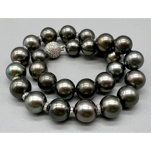 508 - An 18K White Gold Tahitian Grey Pearl Choker Necklace. Gold glitter ball clasp and spacer beads. Pea... 