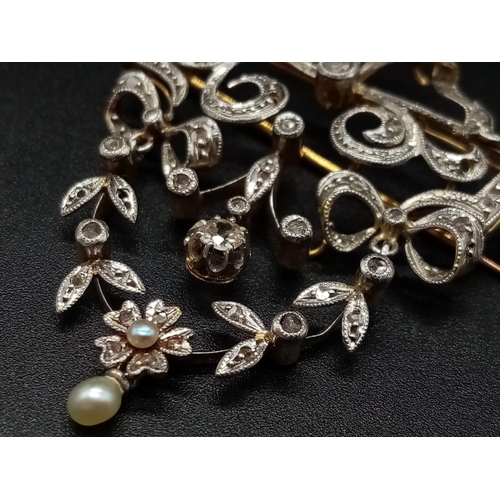 515 - An 18K White and Yellow Gold Diamond and Seed Pearl Antique Brooch. Intricate floral decoration. 4 x... 