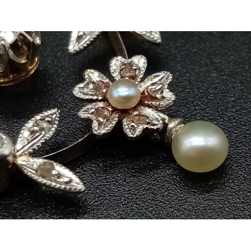 515 - An 18K White and Yellow Gold Diamond and Seed Pearl Antique Brooch. Intricate floral decoration. 4 x... 