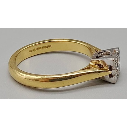 535 - An 18K Yellow Gold Diamond Solitaire Ring. 0.5ct. Round-cut diamond in a square heart setting. Size ... 