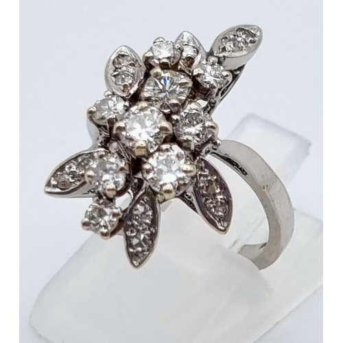 927 - An 18K White Gold Diamond Floral Ring. Size K. 1ct
5.2g total weight.