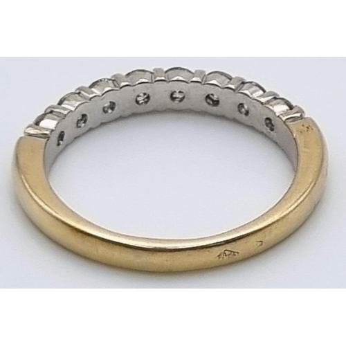 892 - An 18K Yellow Gold Diamond Half Eternity Ring. Eight diamonds - .8ct. Size O. 3.56g total weight.