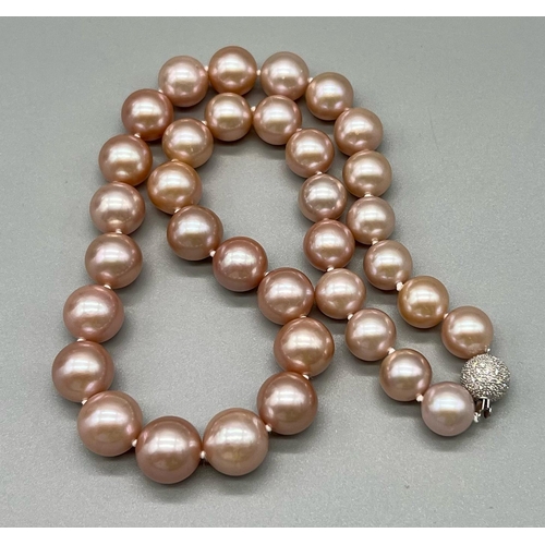 517 - A Fabulous 18k White Gold Natural Tahitian Blush Pearl Necklace. 12mm beads. 18k gold glitterball cl... 