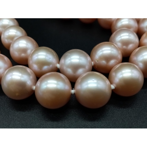 517 - A Fabulous 18k White Gold Natural Tahitian Blush Pearl Necklace. 12mm beads. 18k gold glitterball cl... 