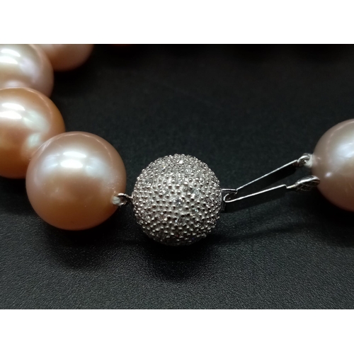 517 - A Fabulous 18k White Gold Natural Tahitian Blush Pearl Necklace. 12mm beads. 18k gold glitterball cl... 