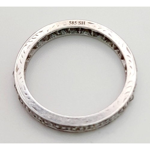 566 - A 14K White Gold Diamond Eternity Ring. 0.80ct.
Size N. 3.91g total weight.