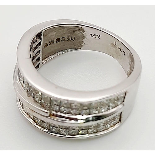 580 - A 14K White Gold Double Band Diamond Ring. 76 square-cut diamonds. 1.87ct. Size N. 6.89g.