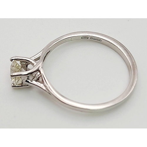 789 - An 18K White Gold Diamond Solitaire Ring. Size L.  0.35g. 2.07g.