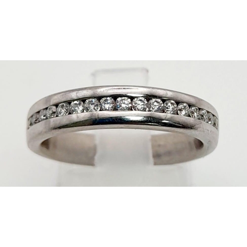 831 - A Platinum and Diamond Half-Eternity Ring.                   17 diamonds - 0.50ct. Size N. 5g total ... 