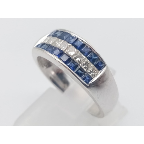 1003 - An 18K White Gold Sapphire and Diamond Three-Row Ring. Nine diamonds -0.5ct, sandwiched in-between 1... 