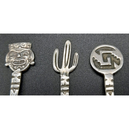 786 - Five Mexican Silver Novelty Spoons. 10cm. 35.7g total weight.