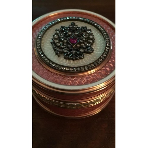 558 - Russian 14k solid gold pink enamel diamond snuff box 
Weight 118 grams
Height 2.8cm
Diameter 4.8cm
T... 