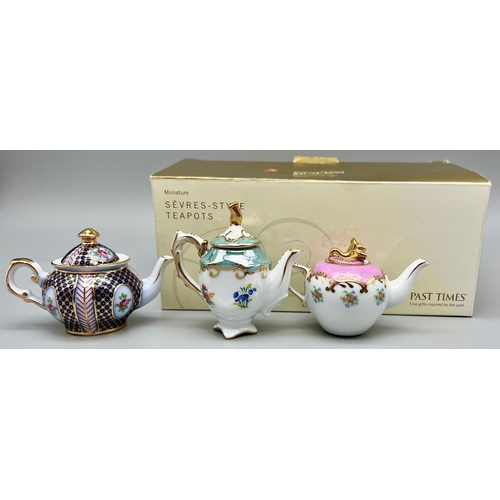 430 - Three Past Times Miniature Porcelain Tea Pots. In original box.