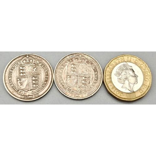 519 - Two 1887 Queen Victoria Silver Shillings. Please see photos for conditions.