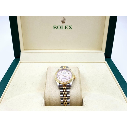 150 - LADIES ROLEX OYSTER PERPETUAL DATEJUST WITH DIAMOND BEZEL AND NUMERALS AND PINK FACE.  
Come with bo... 