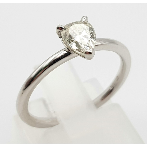 649 - A BEAUTIFUL 18K WHITE GOLD RING WITH A .65CT PEAR SHAPED SOLITAIRE DIAMOND.  2.5gms  size M/N