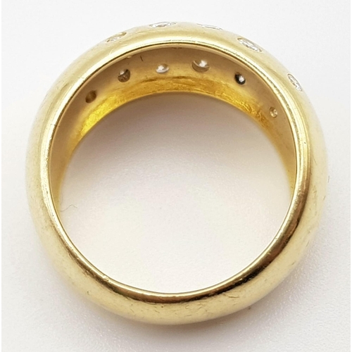 711 - AN 18K GOLD AND DIAMOND RING. 11.6gms size P