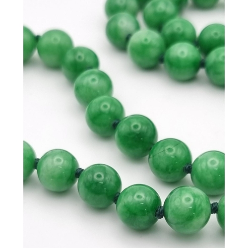 1156 - A Jade Bead Necklace. 8mm beads. 50cm.