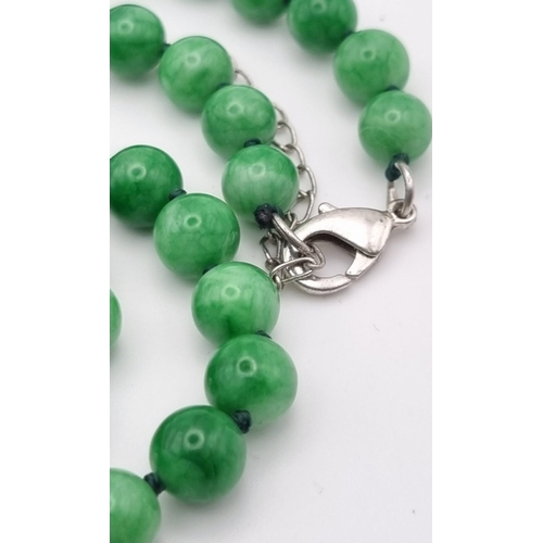 1156 - A Jade Bead Necklace. 8mm beads. 50cm.