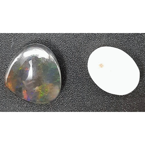 1193 - Lot of 2 Gemstones - 4.35 Ct White Opal & 6.58 Ct Black Opal, Oval & Pear Shape, GLI & IGL&I Certifi... 