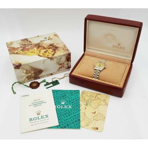 256 - A LADIES BI-METAL ROLEX OYSTER PERPETUAL DATEJUST WITH GOLDTONE DIAL IN ORIGINAL BOX WITH PAPERS.  2... 