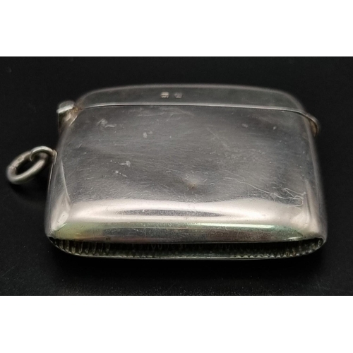 411 - An Antique Silver Vesta Case. Hallmarks for Birmingham 1919. Makers mark of William Hair Hassler. 5.... 