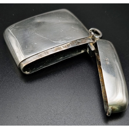 411 - An Antique Silver Vesta Case. Hallmarks for Birmingham 1919. Makers mark of William Hair Hassler. 5.... 