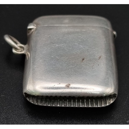 445 - An Antique Silver Vesta Case. Hallmarks for Birmingham 1910. Makers mark of Joseph Gloster. 3 x 4cm