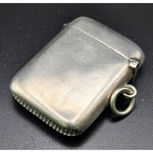 445 - An Antique Silver Vesta Case. Hallmarks for Birmingham 1910. Makers mark of Joseph Gloster. 3 x 4cm