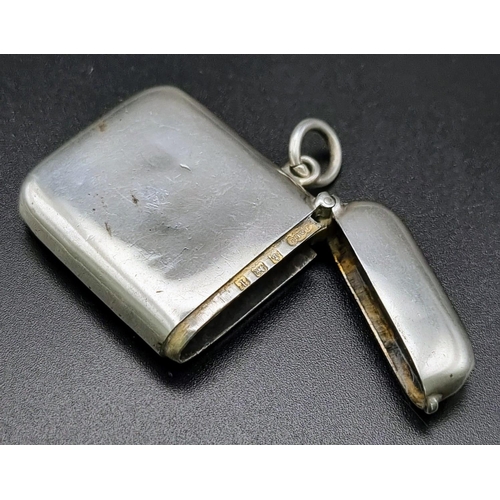 445 - An Antique Silver Vesta Case. Hallmarks for Birmingham 1910. Makers mark of Joseph Gloster. 3 x 4cm