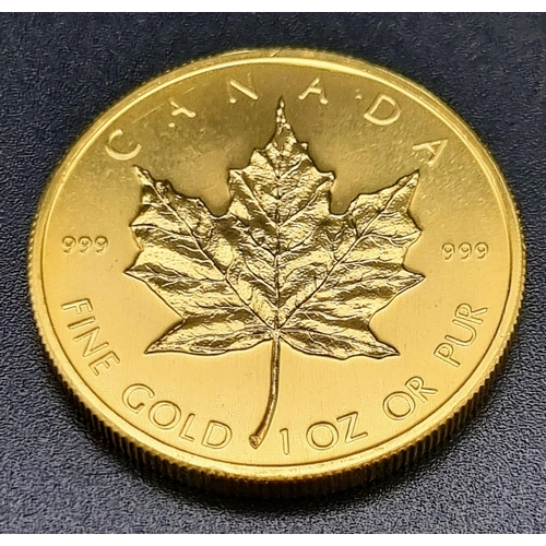 58 - A 1979 Pure Gold (.999) 1oz Canadian Maple 50 Dollar Coin. 31.15g. 30mm diameter.