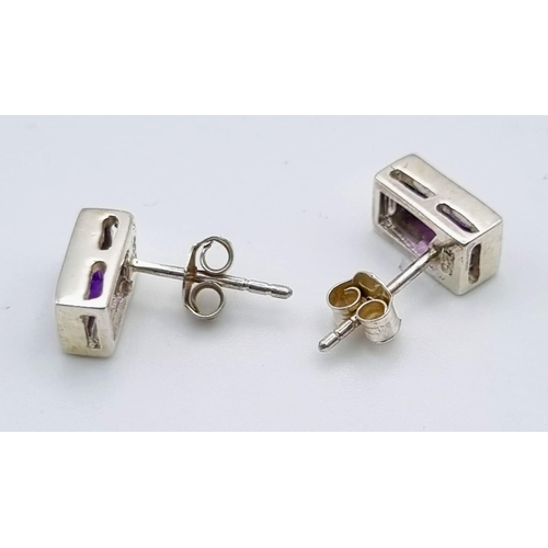 841 - A Pair of 925 Silver and Amethyst Stud Earrings.