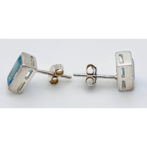 1167 - A Pair of Topaz Silver Stud Earrings.