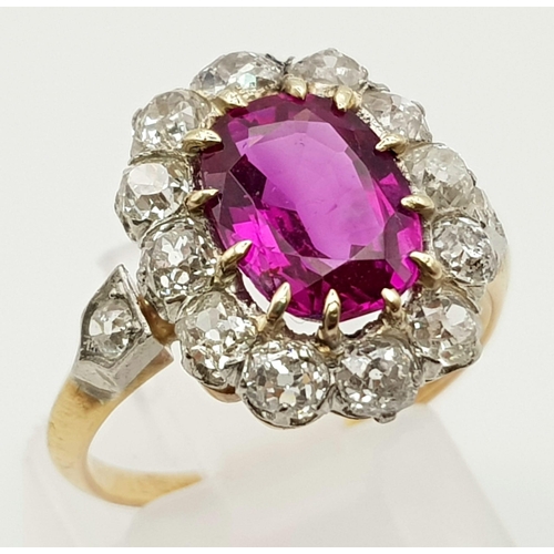 117 - A magnificent 18 K yellow and white gold Ruby & Diamonds ring. Central Burmese Ruby is 3.24 carats, ... 