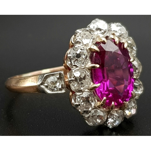 117 - A magnificent 18 K yellow and white gold Ruby & Diamonds ring. Central Burmese Ruby is 3.24 carats, ... 