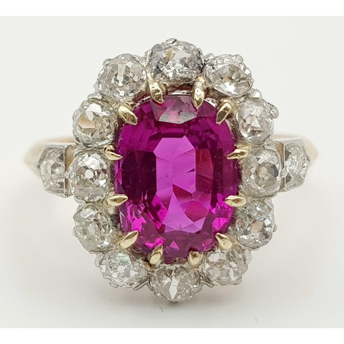 117 - A magnificent 18 K yellow and white gold Ruby & Diamonds ring. Central Burmese Ruby is 3.24 carats, ... 