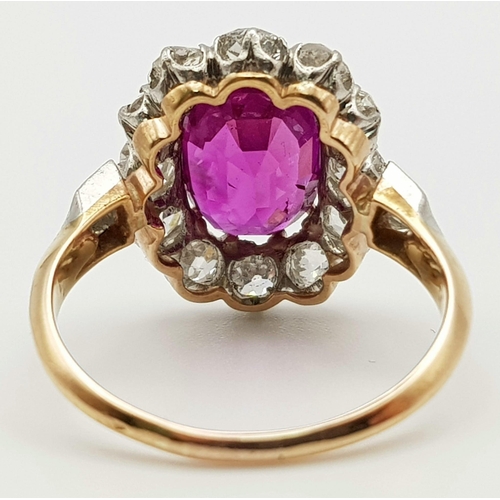 117 - A magnificent 18 K yellow and white gold Ruby & Diamonds ring. Central Burmese Ruby is 3.24 carats, ... 