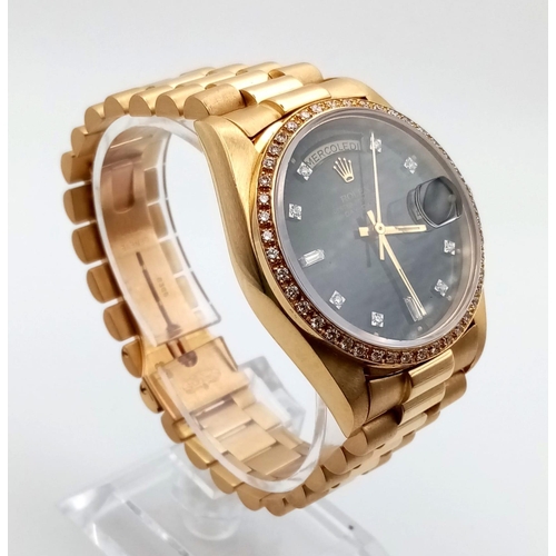 145 - An 18 K yellow gold, gents, ROLEX DAY-DATE OYSTER PERPETUAL watch. 36 mm dial, black face with diamo... 