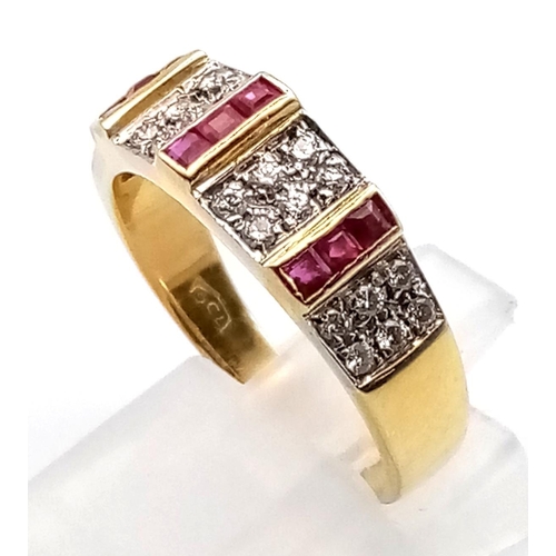 475 - an 18k yellow gold diamond and ruby ring.  5.1gms  size 0