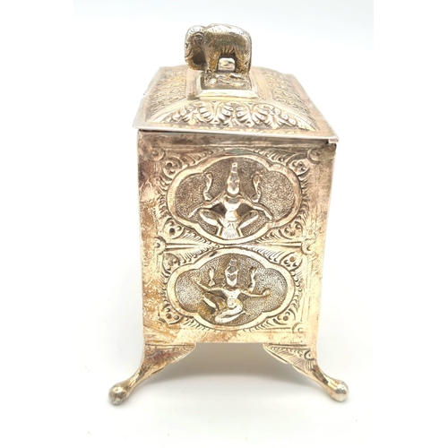 584 - AN EARLY 19TH CENTURY SOLID SILVER BURMESE/INDIAN TEA CADDY WITH HAND MADE ELEPHANT FINIAL TO LID WI... 