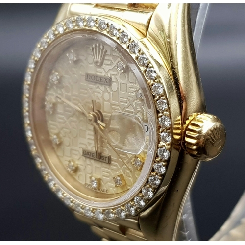 703 - A lovely, ladies, modern, 18 K yellow gold with diamonds ROLEX DATEJUST. 26 mm dial, automatic movem... 