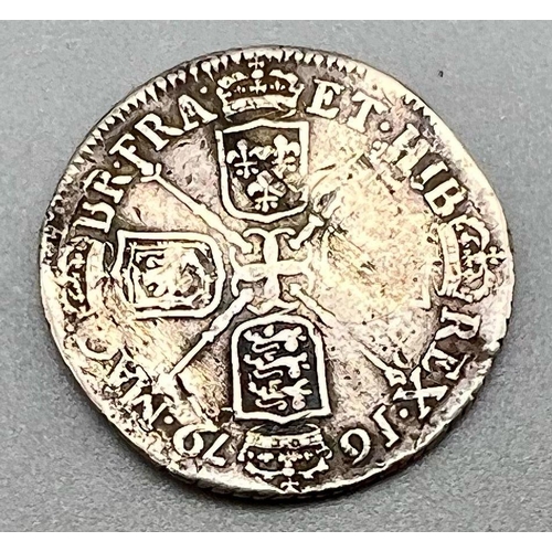 745 - A Charles II 1679 Silver Shilling Coin. Please see photos for conditions.