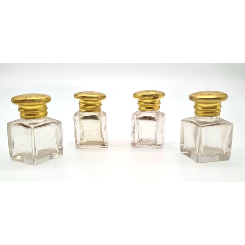 922 - A VICTORIAN SET OF 4 GILT TOPPED PERFUME BOTTLES IN ORIGINALCARRYING BOX (BOX NEEDS HINGE ATTENTION)... 