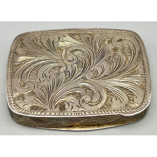 924 - AN ANTIQUE AUSTRIAN SOLID SILVER AND ENAMEL BOX WITH HAND ENGRAVING.  64.2gms  7 x 5 x 1cms